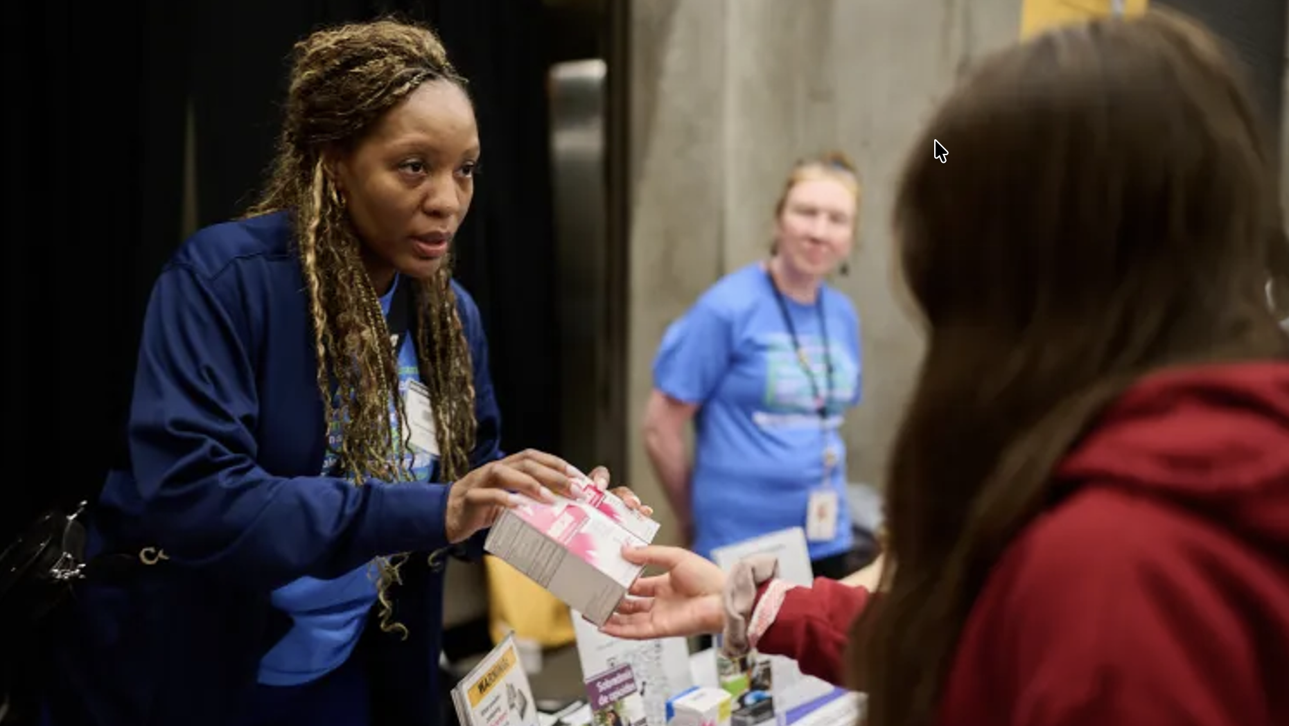 A Public Health staffer working at the annual Seattle/King County Clinic at the Seattle Center