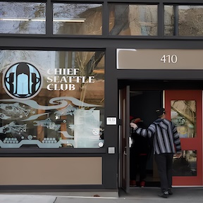Man entering the Chief Seattle Club for support services