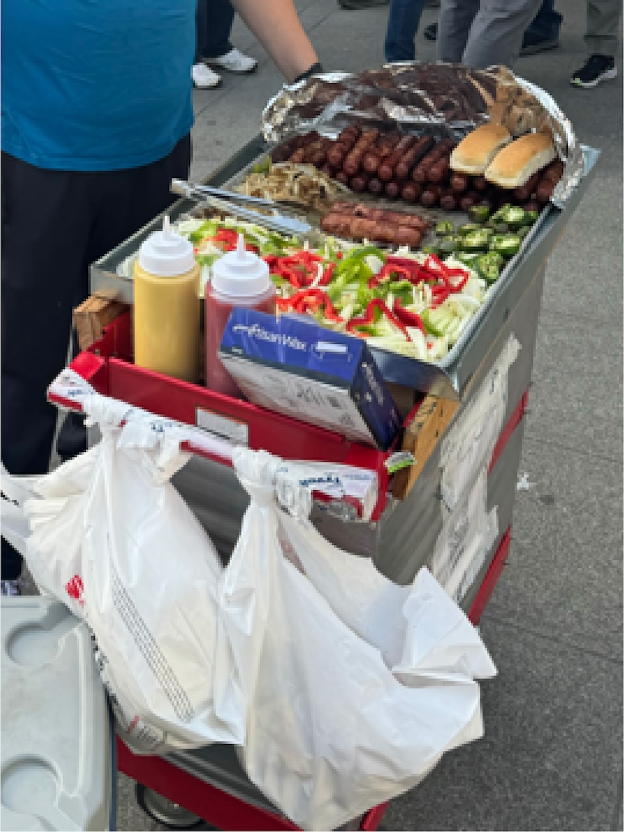 Unpermitted push cart used by a vendor making and selling food on the street in the Seattle Capitol Hill District