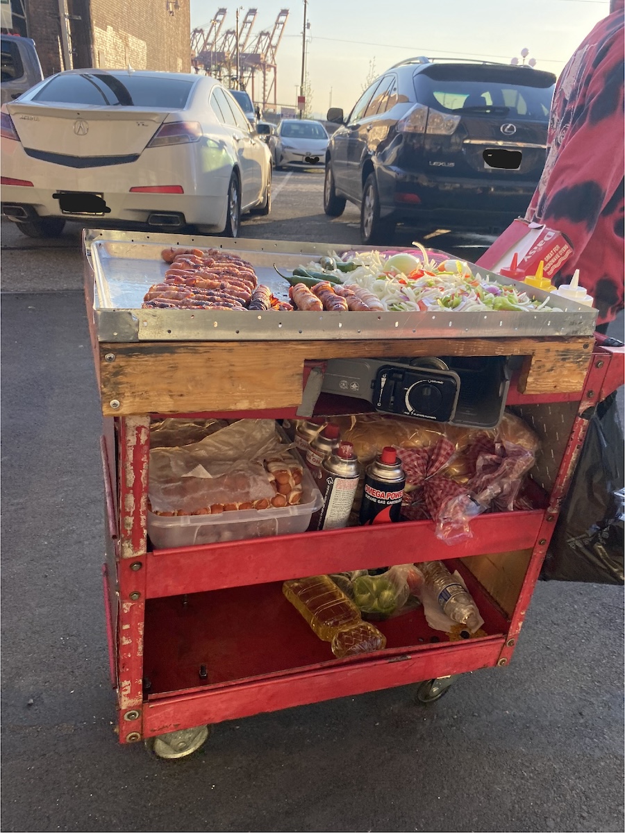 Unpermitted push cart used by a vendor making and selling food on the street near the SoDo sports stadiums