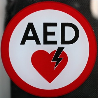 AED sign with symbol of heart and electrical bolt