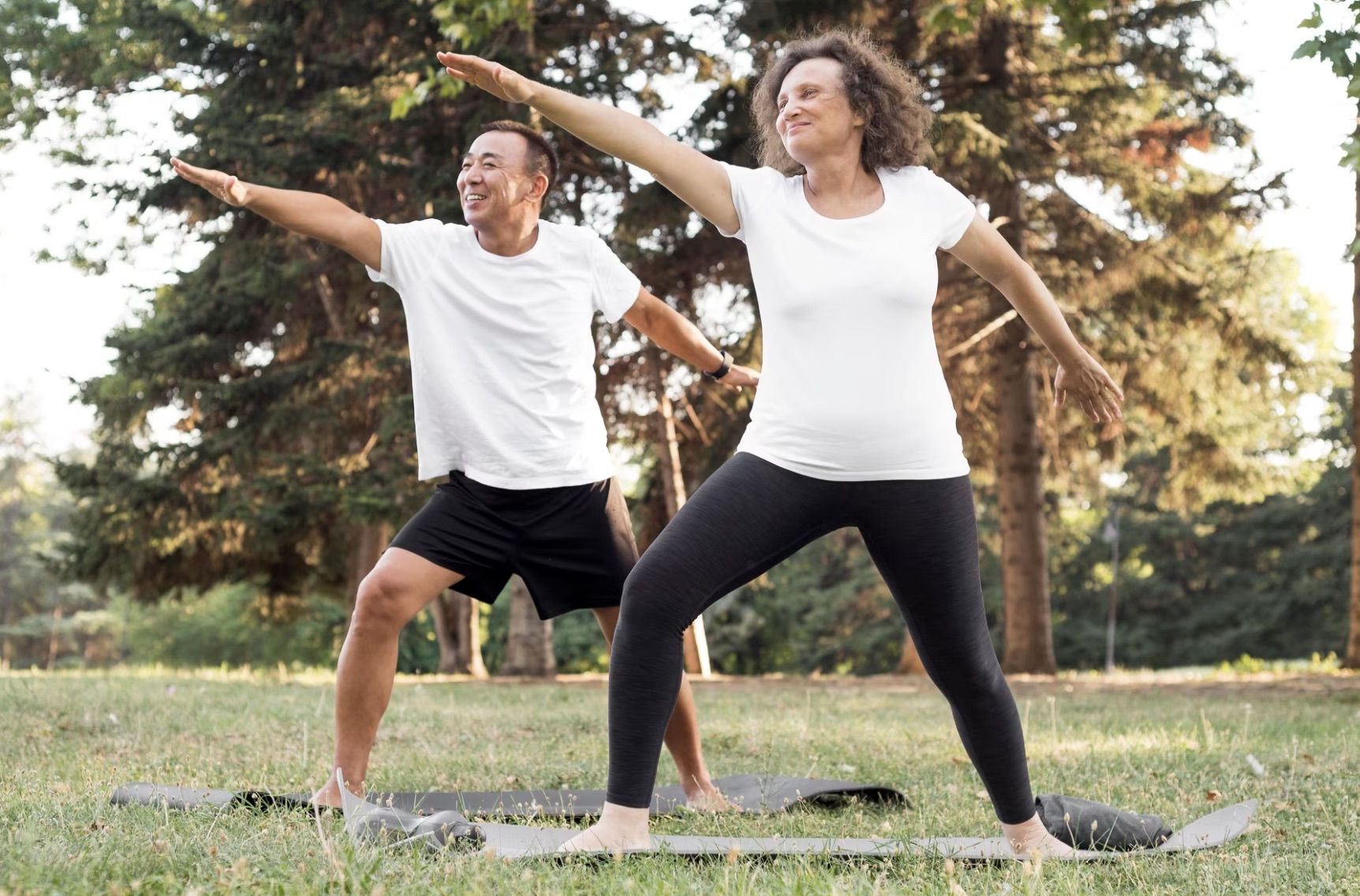 Elder couple doing yoga