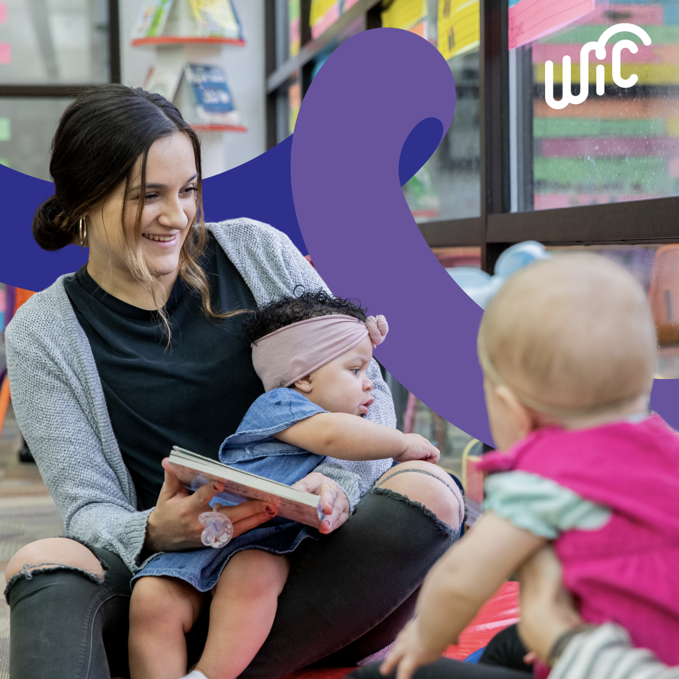 Image of a young mom and her baby and another baby in the foreground at a child care facility. Image courtesy of the National WIC Association.