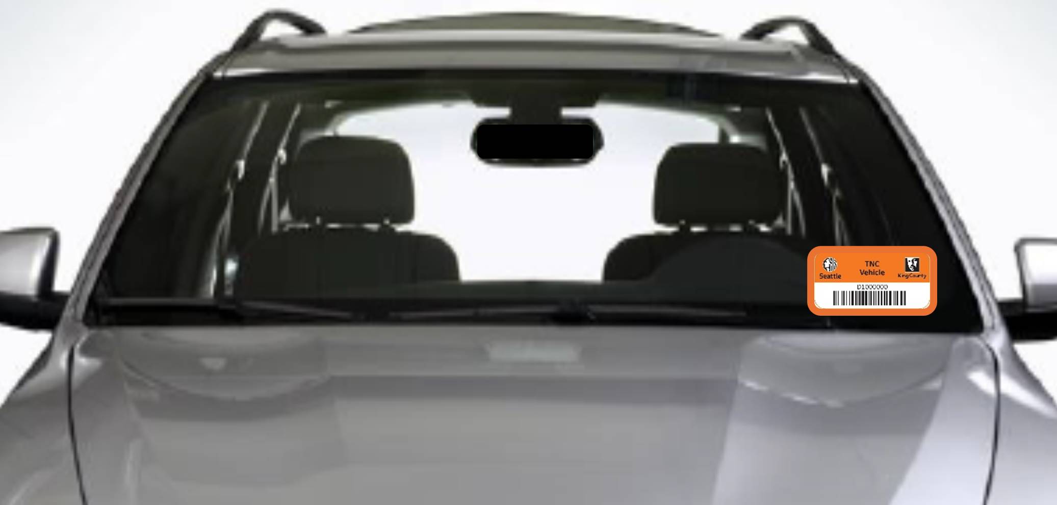 Display the TNC vehicle decal in the lower corner of the windshield driver side