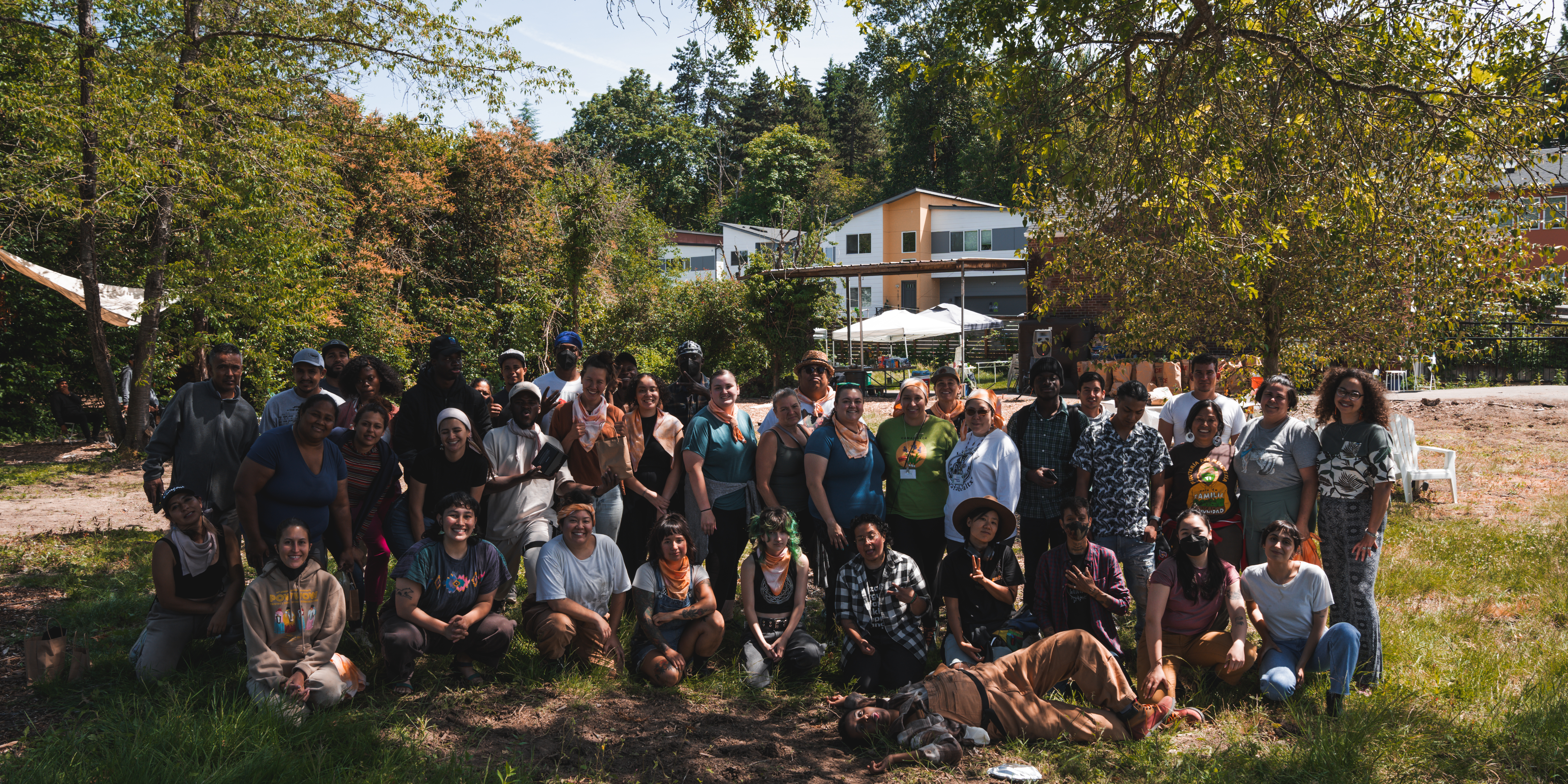 large group of community members pose for photo