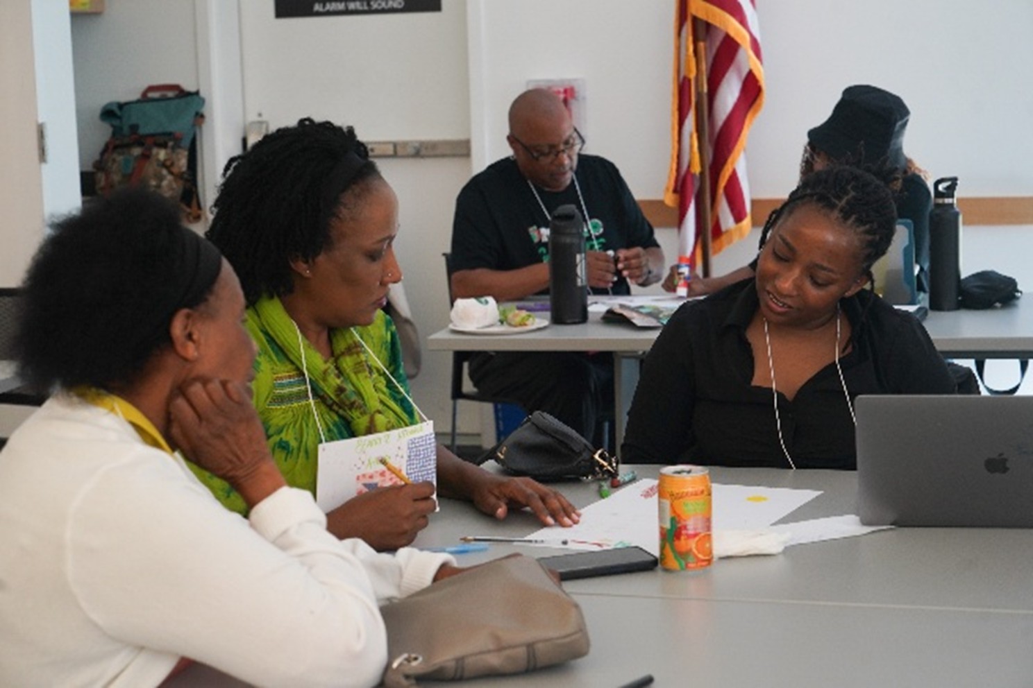 group of women talking at a table