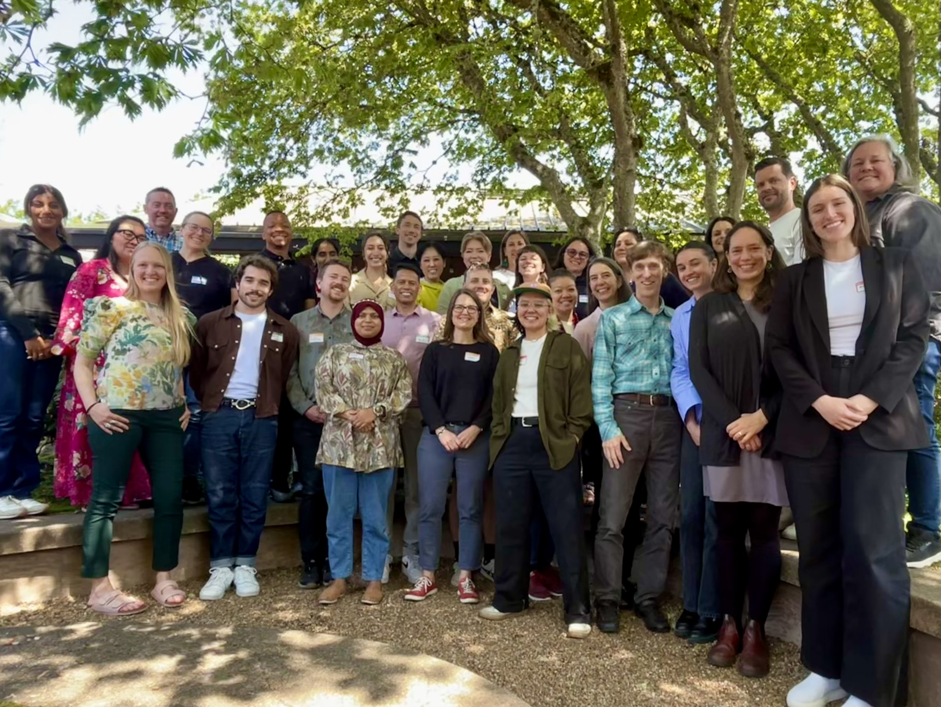 group of people posed and smiling