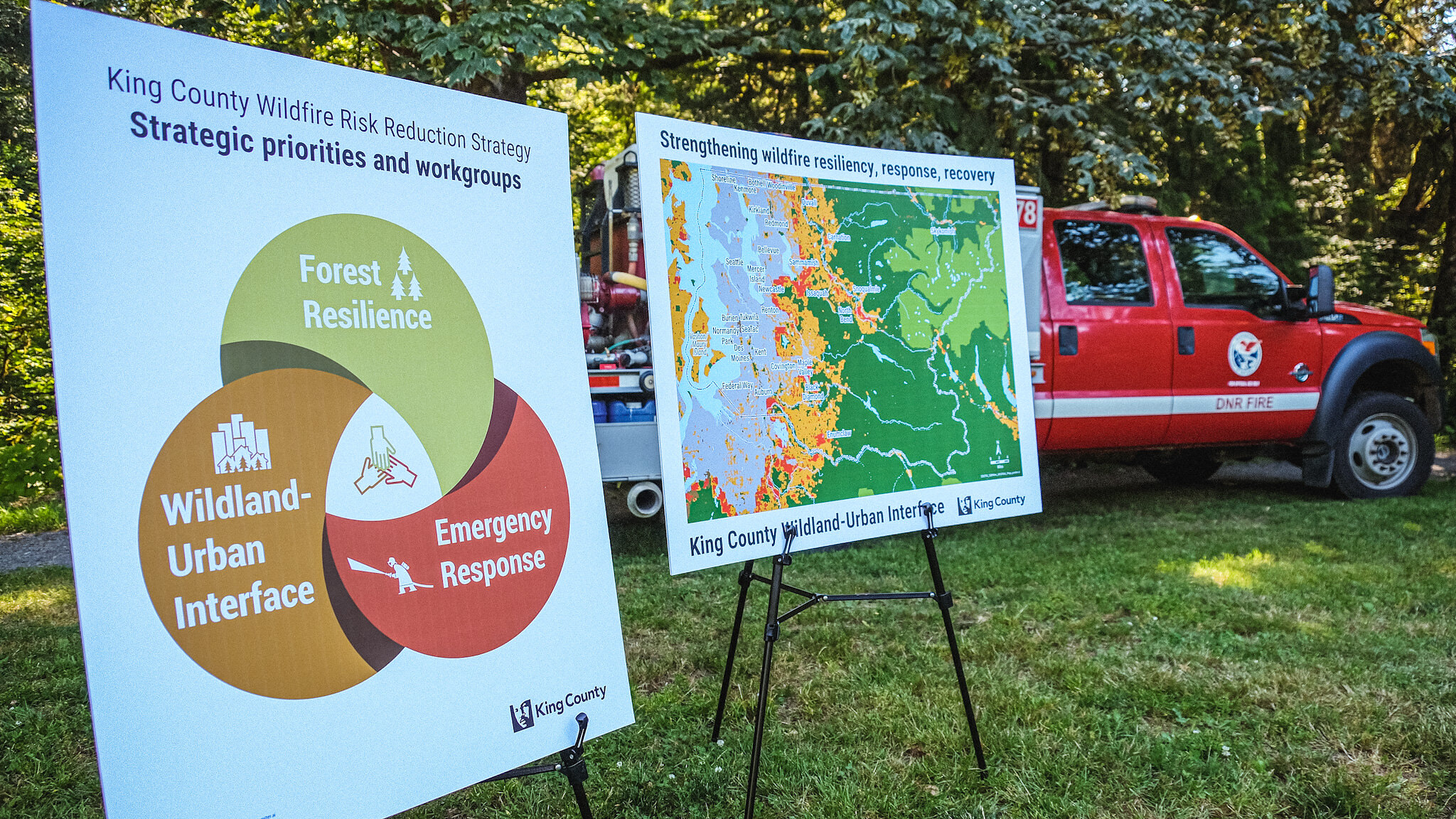 fire truck with sign showing a map of the wildland-urban interface