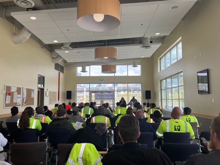 group of people listening to training