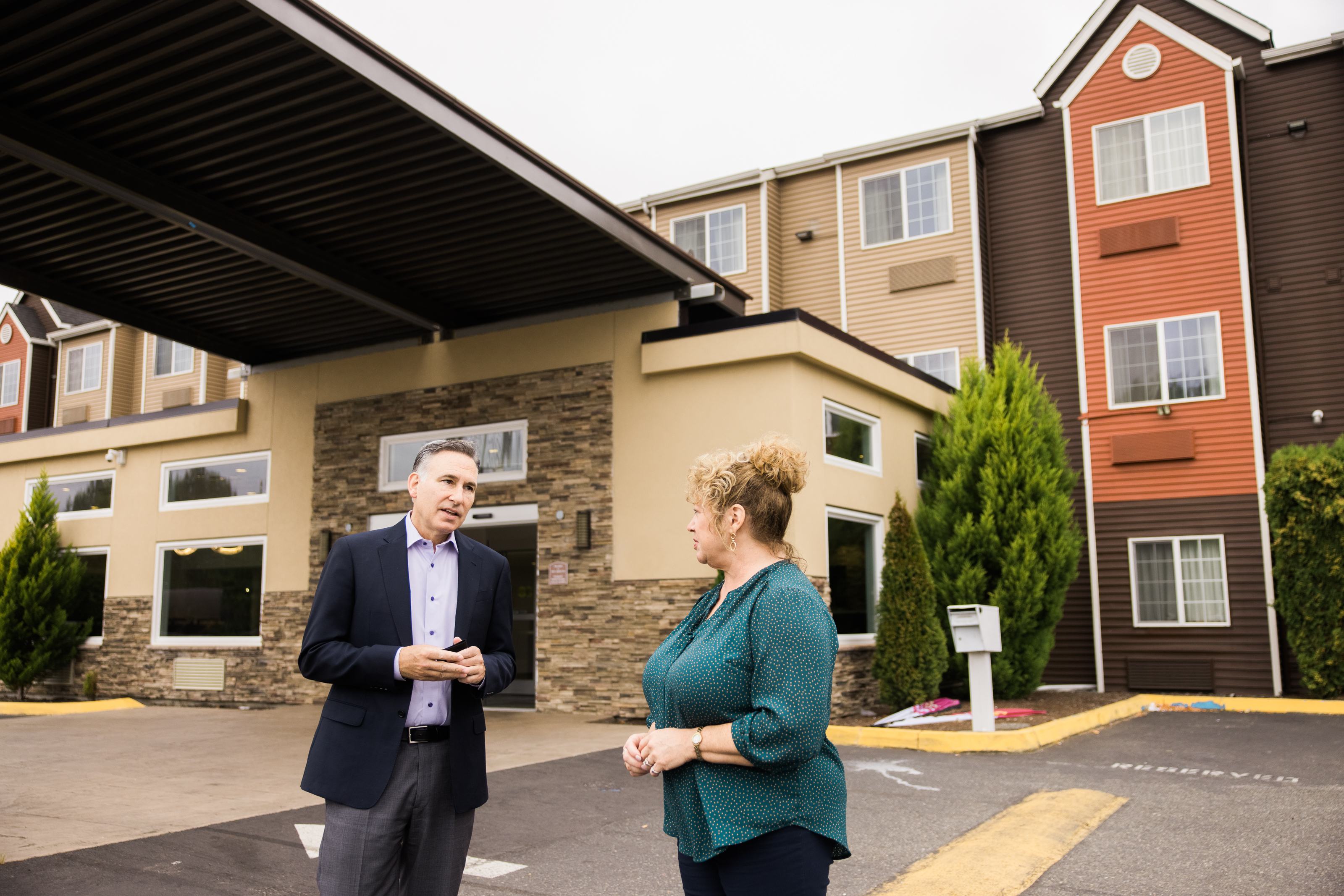 Executive Constantine and Auburn Mayor Nancy Backus at a Health Through Housing hotel purchase
