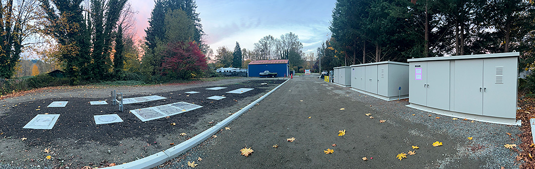 Sunrise over covered treatment plant