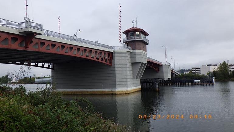 South Park Bridge and waterway on cloudy day