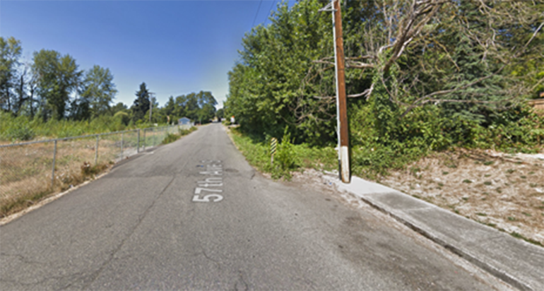 A road with trees on the side.