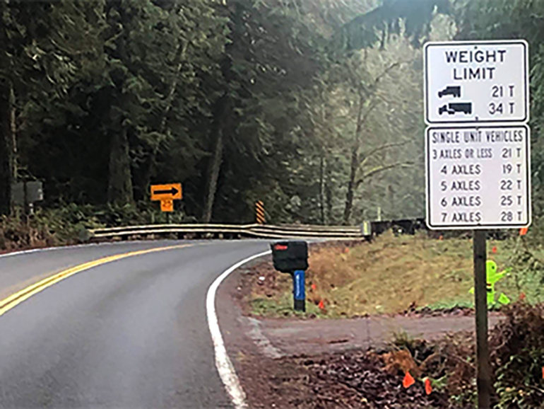 Vehicle weight restriction signs for the Ames Lake Trestle Bridge