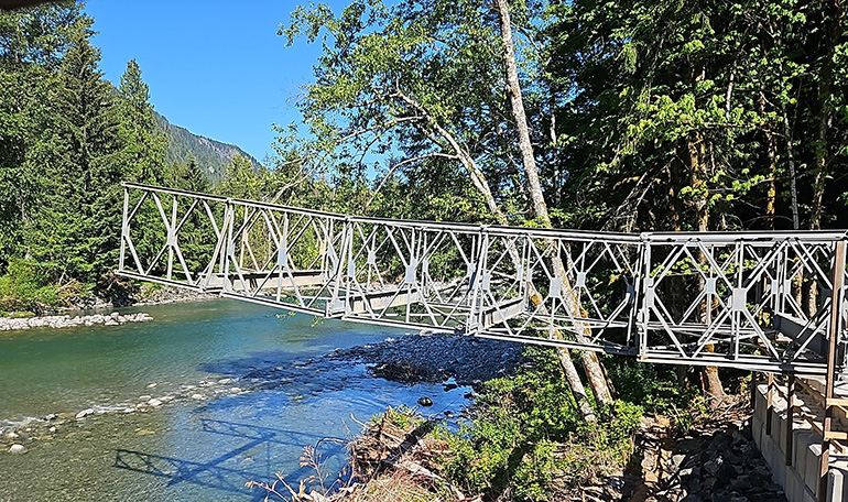 Temporary bridge being installed