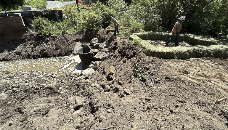 Crews setting up a pump