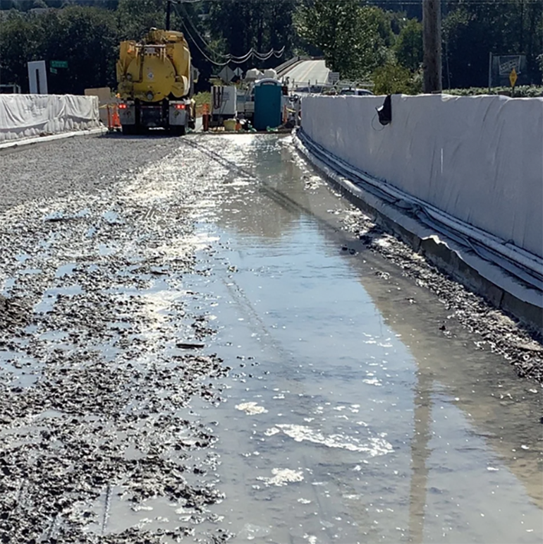 A bridge deck demolished by a high-pressure water tool to selectively remove concrete