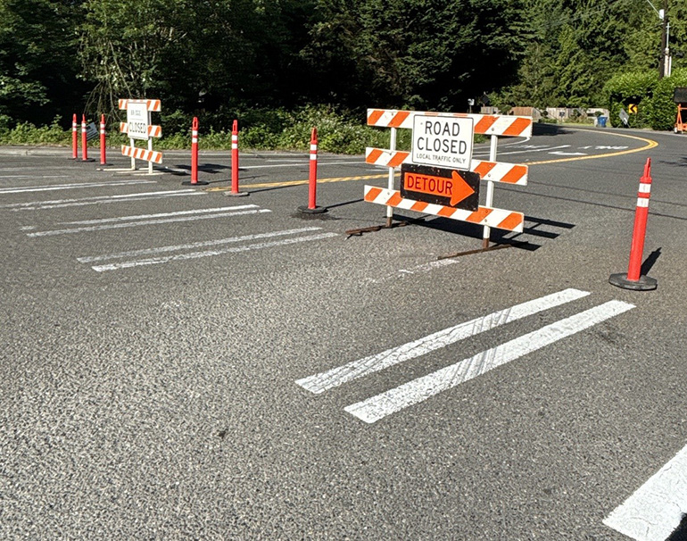 Closed road barriers across road