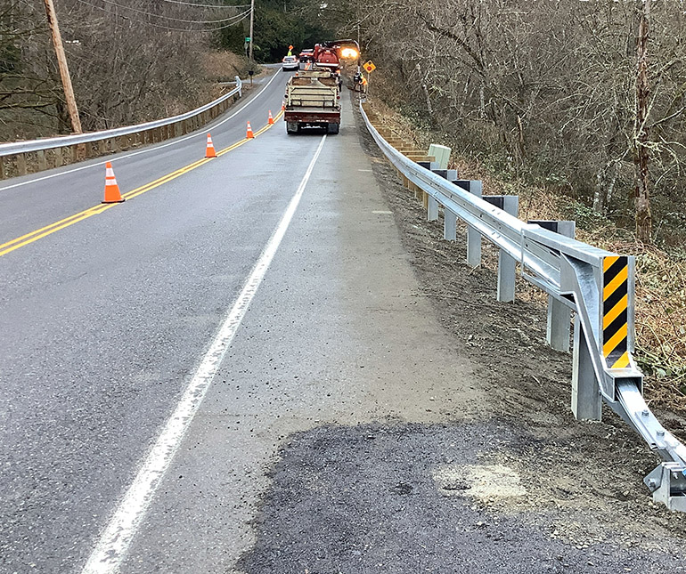 Crews install new guardrail down SE 208th Street from 140th Avenue SE to 148th Avenue SE