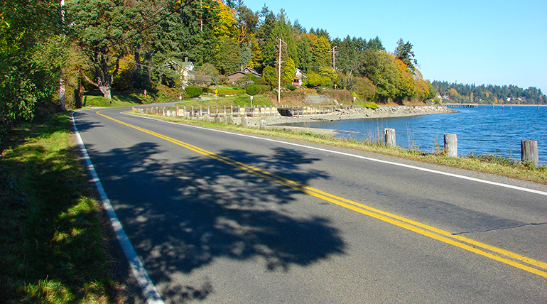 Curve in road along sea shore