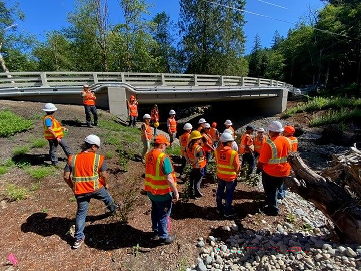 Interns on a site visit at a bridge in unincorporated King County.
