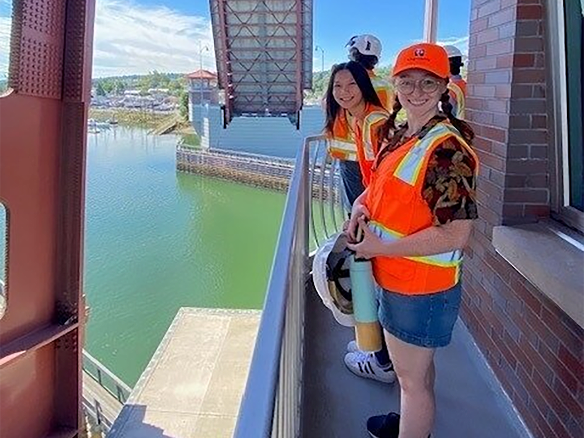Interns at the South Park Bridge over the Duwamish River, bridge in open position.