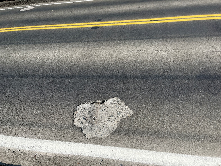 Pothole on a bridge deck.