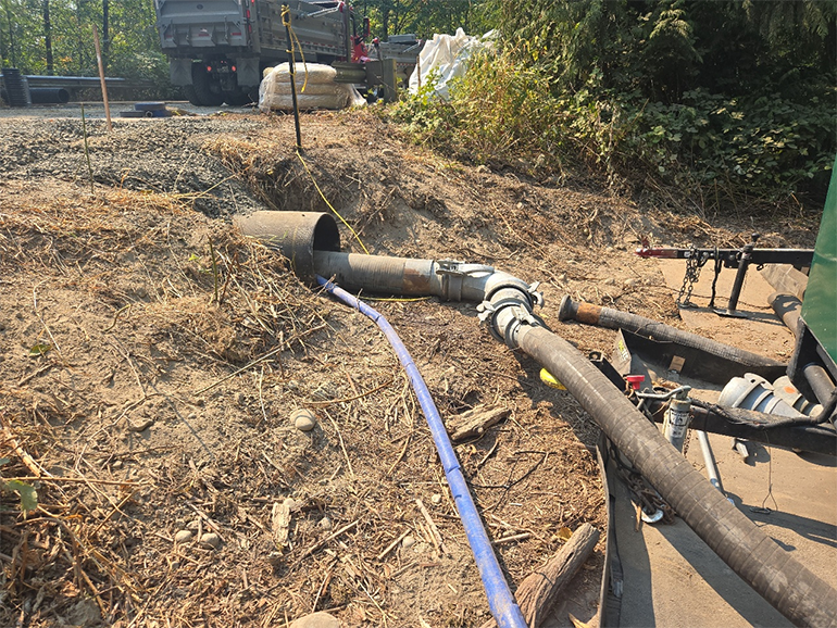 Pipes going under ground at worksite