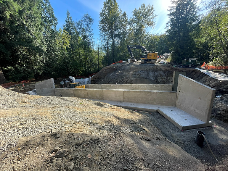 Large ditch with concrete walls and segments