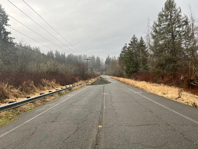 Road with water over it