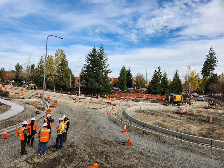 Crews plan the next steps of the Redmond Ridge roundabout at NE Alder Crest Dr. 