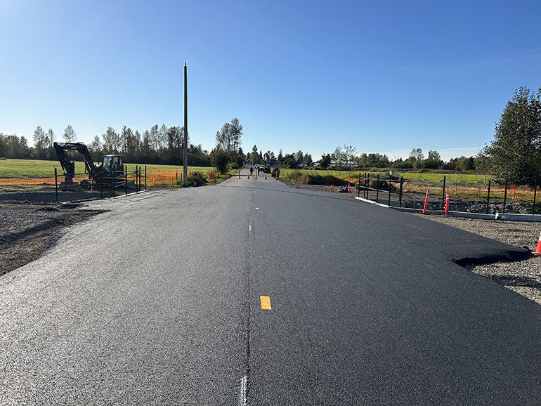 Fresh pavement over newly installed box culvert over SE 432nd St