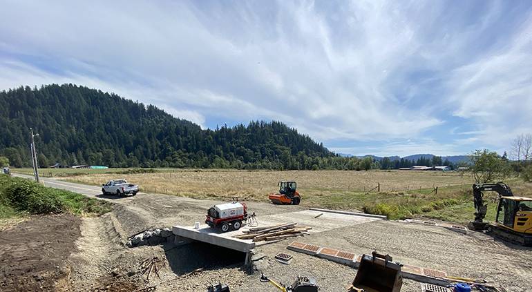 New culvert with the newly built-back road.