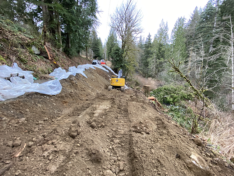 Dirt slope with construction crane