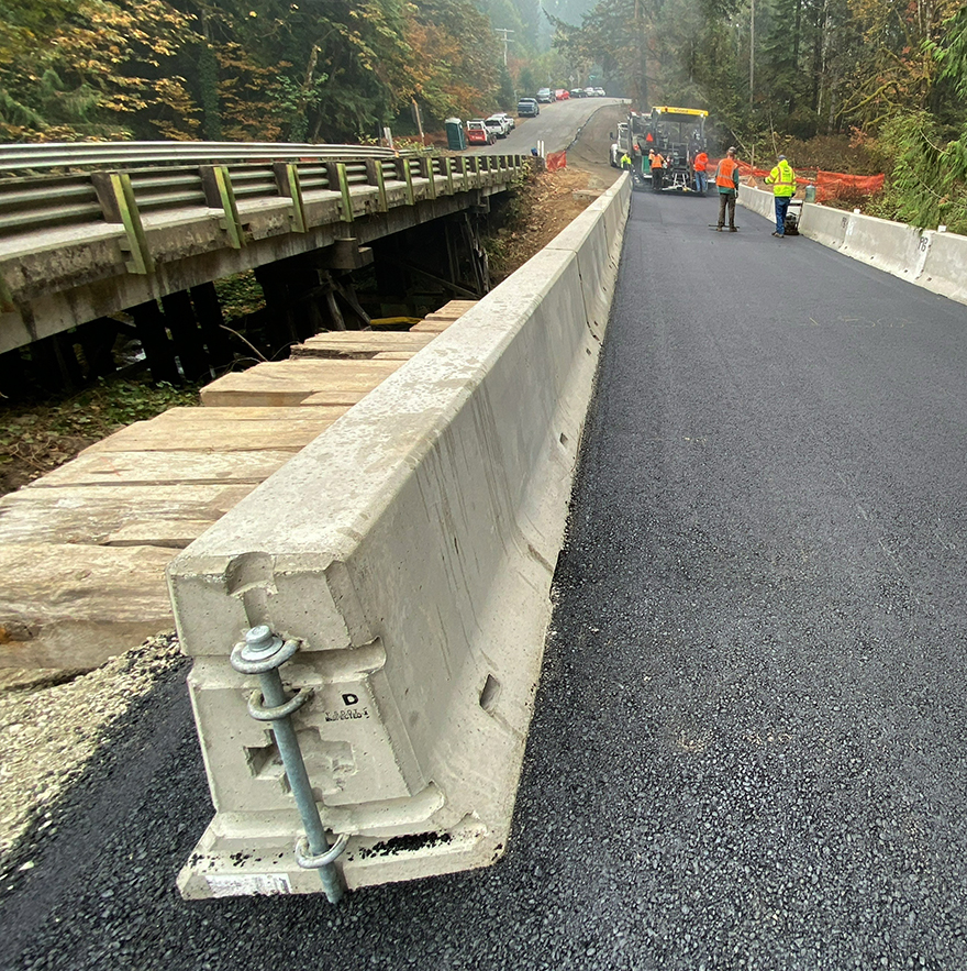 Oct. 20, 2022 – The temporary bridge gets paved before traffic switches over in late October.