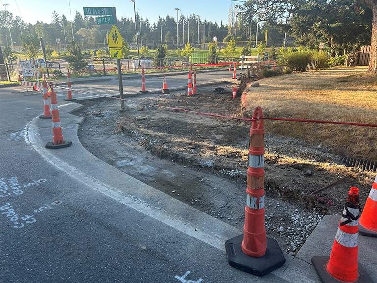 Active construction in road at intersection