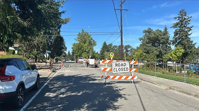 Road closed sign at the project site, 10th Ave SW between SW 112th Street and SW 116th Street.