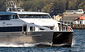 The Sally Fox passes Alki Point on the way to the Vashon Terminal.