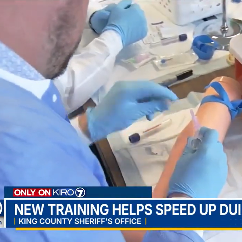Person training to become certified phlebotomist