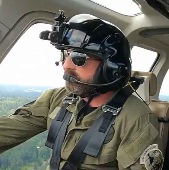 Helicopter pilot on search and rescue mission