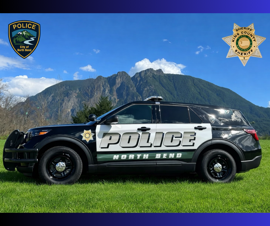 North Bend Police - Sheriff vehicle in front of mountain