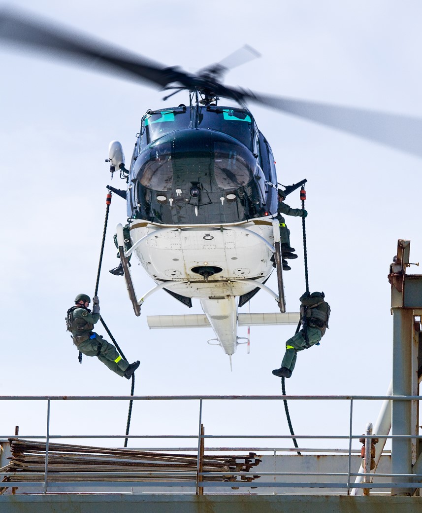 Guardian 1, 2 deputies repelling onto ship