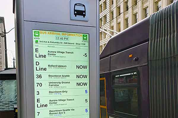 Digital transit sign at a bus stop